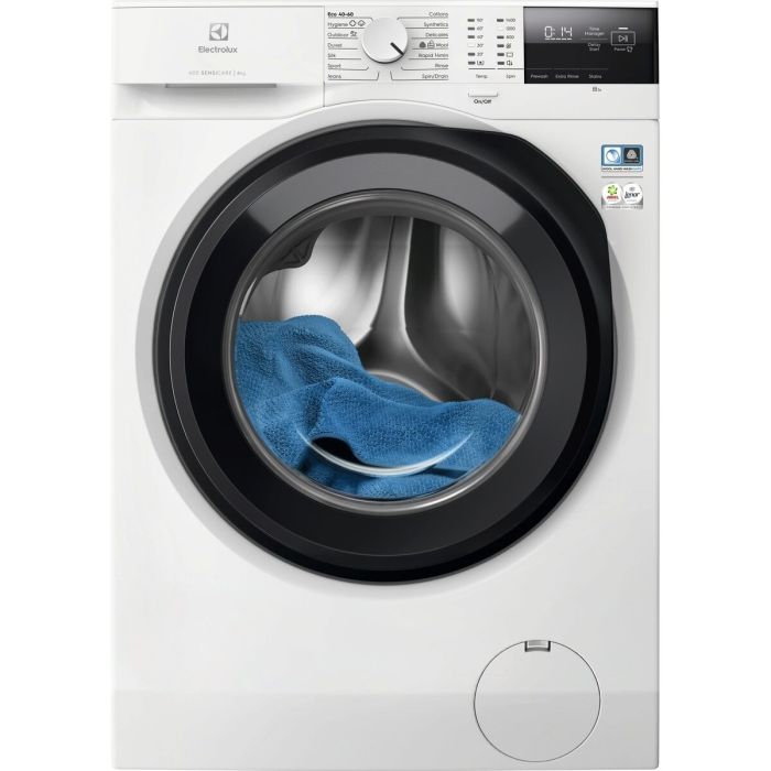 Бяла пералня Electrolux EW6F2482E с тъмносив люк и синя кърпа в барабана